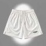 Represent Swim Shorts front view in UK style
