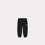 Black parachute pants front view showing the relaxed fit and overall leg shape.